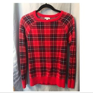 Red, white, and black sweater